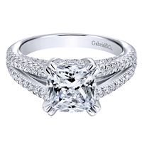 This fabulous cushion cut split shank diamond engagement ring is chock full of round brilliant diamonds with 2/3 carats of shimmering radiance!