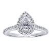 This pear shaped diamond halo engagement ring is simmering with 1/3 carats of round brilliant diamonds and is set in beautiful and durable platinum.