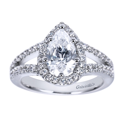 Platinum bands come together to form a pear shaped halo in this platinum split shank pear diamond halo engagement ring.