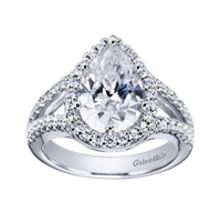 Double rows of round brilliant diamonds greet  pear shaped diamond halo in this platinum engagement ring.