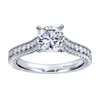 Some style to go along with substance is always appreciated, with 1/3 carats in round brilliant diamonds and your choice of white gold or platinum, this vintage style engagement ring is definitely stylish and substantial