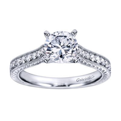 Some style to go along with substance is always appreciated, with 1/3 carats in round brilliant diamonds and your choice of white gold or platinum, this vintage style engagement ring is definitely stylish and substantial