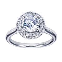 A smooth band in white gold or platinum meets a double halo of round diamonds in this contemporary halo engagement ring.