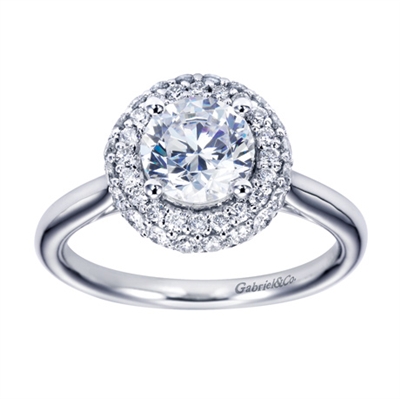 A smooth band in white gold or platinum meets a double halo of round diamonds in this contemporary halo engagement ring.
