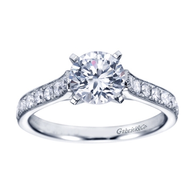 White gold and round diamonds mix spectacularly to form this vintage straight engagement ring available in white gold or platinum, featuring over 1/3 carat in diamonds.