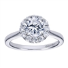 This stylish and unique solitaire style halo engagement ring boasts top qulaoty round brilliant diamonds all surrounding a shimmering round center diamond fo your choice.