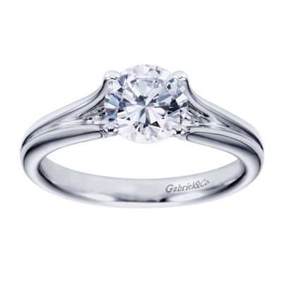 A white gold solitaire engagement ring with a contemporary twist! Designed by Gabriel & Co.