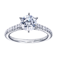 Straight white gold bands and round diamonds firm up this white gold contemporary straight engagement ring.