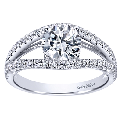 This uniquely style diamond engagement ring with a split shank band features over one half carats of round brilliant diamonds!