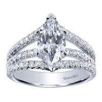 This marquise shaped diamond split shank engagement ring features nearly one carat of round brilliant diamonds is offered in white gold or platinum.