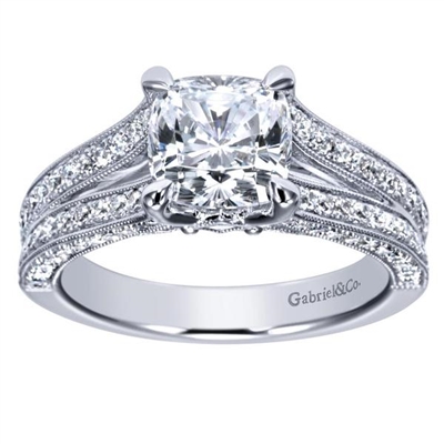 This artistic diamond engagement ring with 2/3 carats round brilliant diamonds is made especially for a cushion cut diamond.