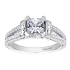 This diamond studded split shank princess cut diamond engagement ring glistens with 0.39 carats of round brilliant diamonds, all cushioning a princess cut center diamond.
