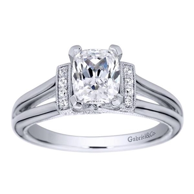 This split shank diamond engagement ring is in a solitaire style with the round diamonds assembling at the center, surrounding the oval cut diamond of your choice.