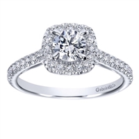 This round brilliant diamond halo engagement ring features a round center diamond and side round diamonds all included in this engagement ring!