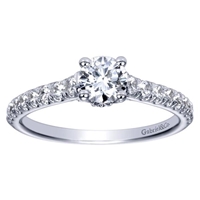 This chic and stylish straight round diamond engagement ring comes complete with a round center diamond that delivers the message.