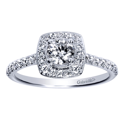 This sleek and shimmering 14k white gold diamond halo engagement ring features an included center diamond to make this the easiest decision of your life!