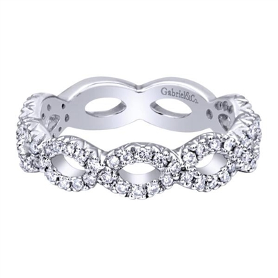 Almost one half carats of round brilliant diamonds weave up and down and all around this 14k white gold diamond stackable ring made available by Gabriel and Co.