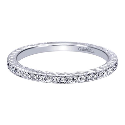 This sleek and subtle 14k white gold diamond stack band is a perfect compliment to other in your collection, it is also a great eternity style band!
