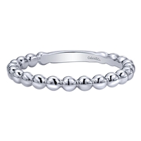 This simple and cool beaded stack ring comes in 14k white gold and teams up well with others!