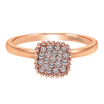 This rose gold fashion ring set with round brilliant diamonds features nearly one quarter carats of round brilliant diamonds set in a center cluster setting.