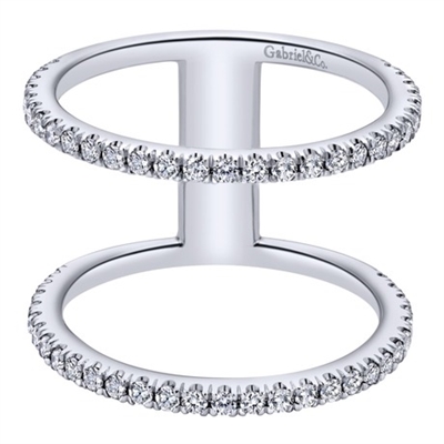 Exaclty one half carats in round brilliant diamonds brilliantly blaze their way over 14k white gold in this fashion inspired double diamond band ring.