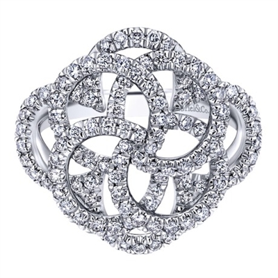 A swirling and spiraling round brilliant diamond masterpiece, shimmering and shining over 14k white gold in this mystic wheel diamond fashion ring.