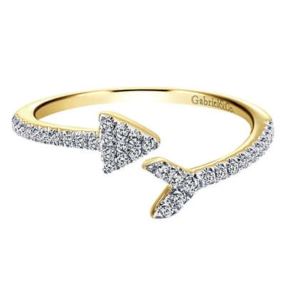 14k yellow gold mixes with 0.18 carats of diamond in this fashionable and trendy arrow shaped ring in yellow gold.