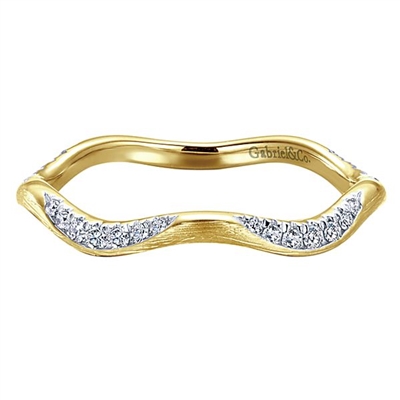 This unique 14k yellow gold stackable ring has a wave design.