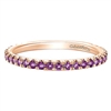 This 14k rose gold stackable ring features purple amethyst.