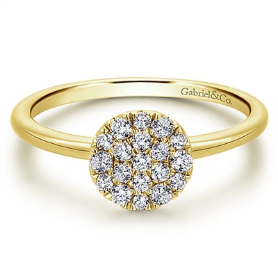 This 14k yellow gold diamond cluster ring features 0.25 carats of diamonds.