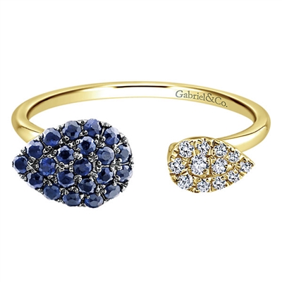 This glowing sapphire and diamond ring features bright blue sapphires and shimmering white diamonds in 14k yellow gold!
