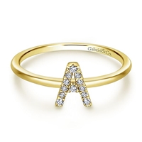 Beautiful and sleek, 14k gold and diamonds weave together to create this stackable diamond initial ring.