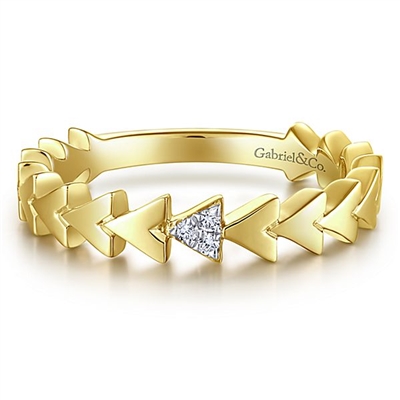 This 14k yellow gold pyramid diamond stackable ring features diamond accents.