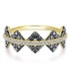 This 14k yellow gold diamond stackable ring features black and white diamonds.