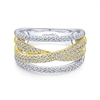 White and yellow gold bands twist with diamonds in this fashion ring.