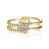 This 14k yellow gold diamond stackable ring features beaded gold with rows of diamonds.