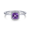 A diamond and purple amethyst in 14k white gold ring.