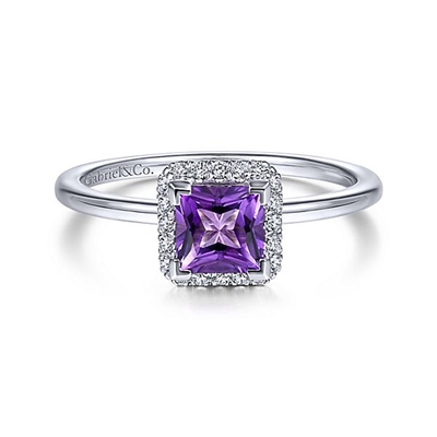 A diamond and purple amethyst in 14k white gold ring.