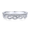 This 14k white gold diamond ring features a band attached to a simple 14k infinity bands.