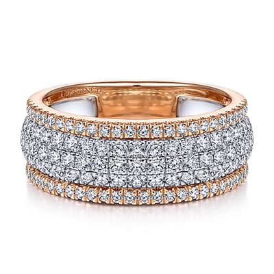 A 14k rose gold and 14k white gold diamond ring with over 1 carats of diamonds.