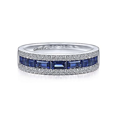 This spectacular sapphire and diamond ring features nearly one quarter carats of diamond splendor in 14k white gold.