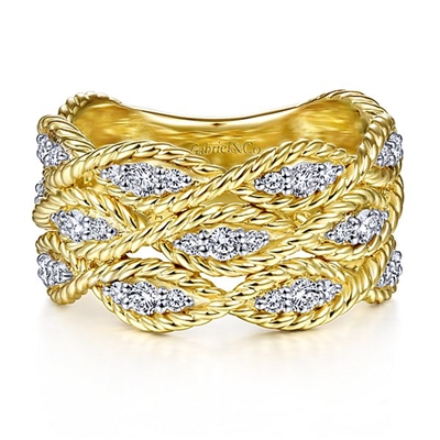 14k yellow gold braids twist in diamonds in this 14k yellow gold diamond ring.
