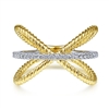 This 14k two tone diamond x ring features 0.15 carats of diamonds.
