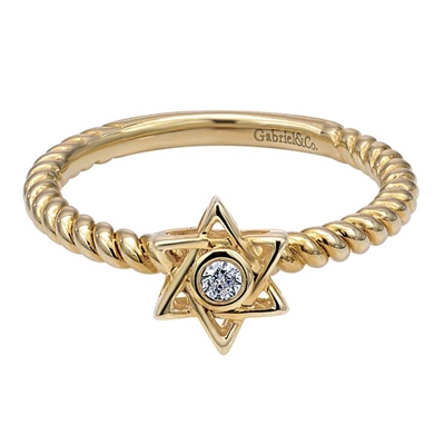 This 14k yellow gold ring features a diamond in the center of a star of david.