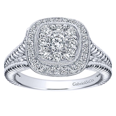 This diamond cluster ring blasts off with 0.65 carats of diamond shine in 14k white gold.