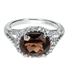 A 14k white gold diamond ring with one third carats of diamonds with a center smoky quartz.