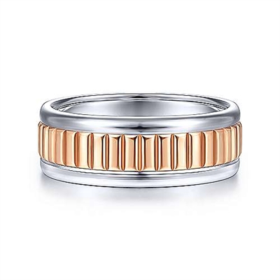 This 14k rose and white gold men's wedding band is 8mm wide and features a ridged center section.
