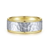 This hammered wedding band is featured in 14k yellow and white gold and is 6mm wide.