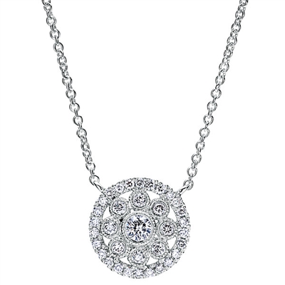 This diamond cluster necklace features a round diamond halo encircling a diamond flower in this white gold diamond pendant, featured with a 14k white gold link chain