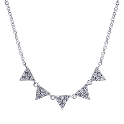 This 14k white gold diamond necklace with five diamond triangle sections glistens with over one quarter carats of graceful elegance.
